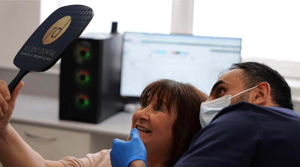 Patient checking implant retained dentures
