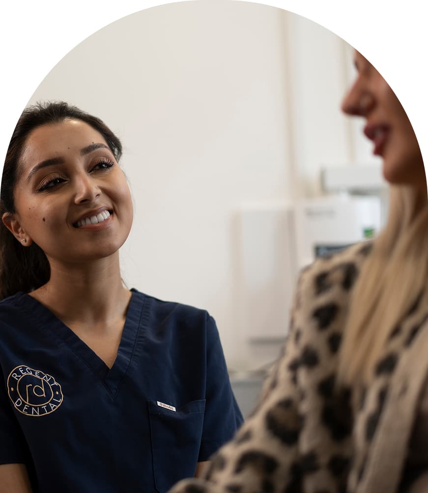Regent Dental team member discussing dental plan options with a patient